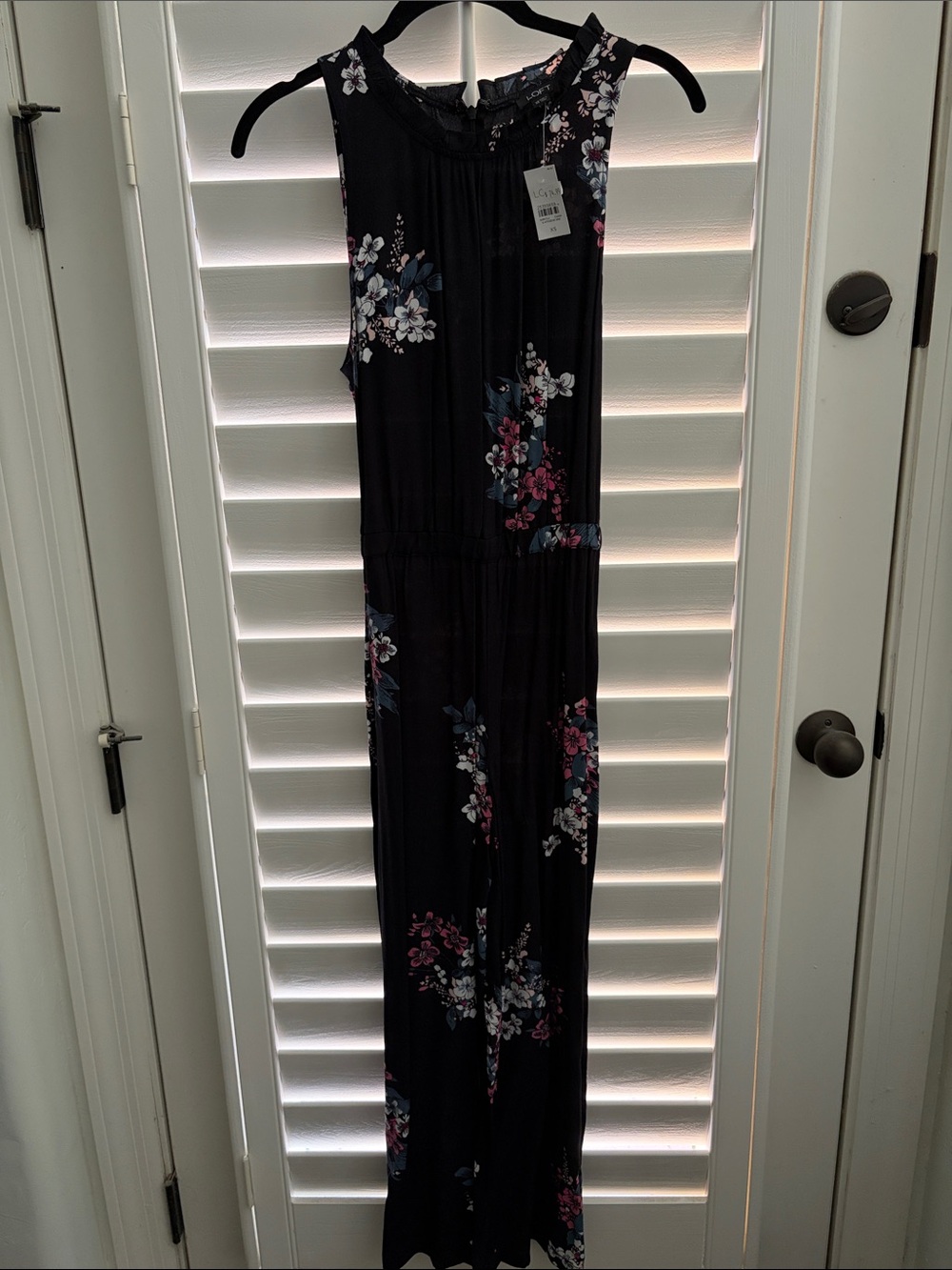 LOFT Size XS Black Sleeveless Floral Jumpsuit